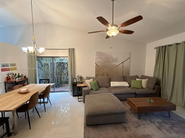 tiled living room featuring lofted ceiling and ceiling fan with notable chandelier