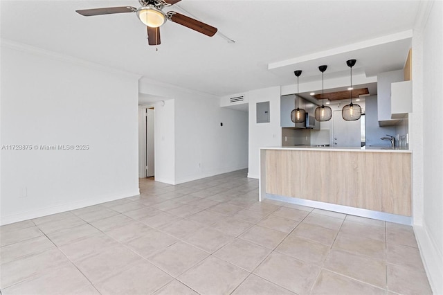 interior space with ceiling fan, light tile patterned floors, crown molding, and electric panel