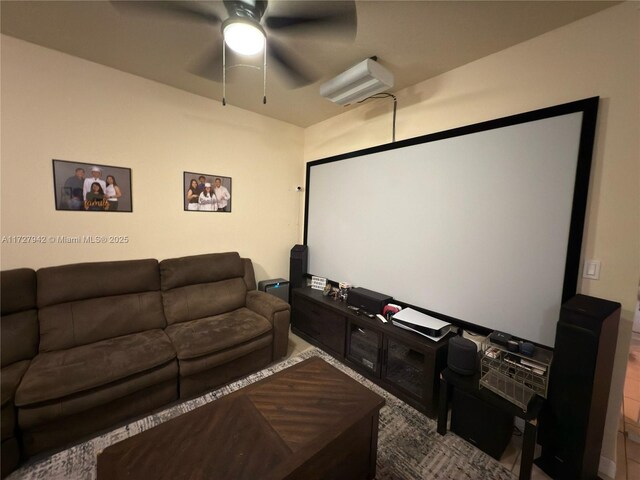 cinema featuring a wall mounted air conditioner and ceiling fan