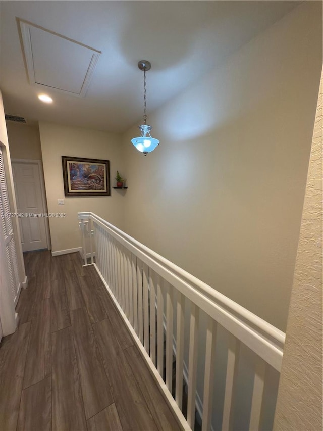 hallway featuring dark hardwood / wood-style floors