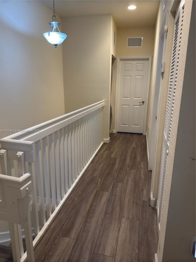 hall featuring dark hardwood / wood-style floors