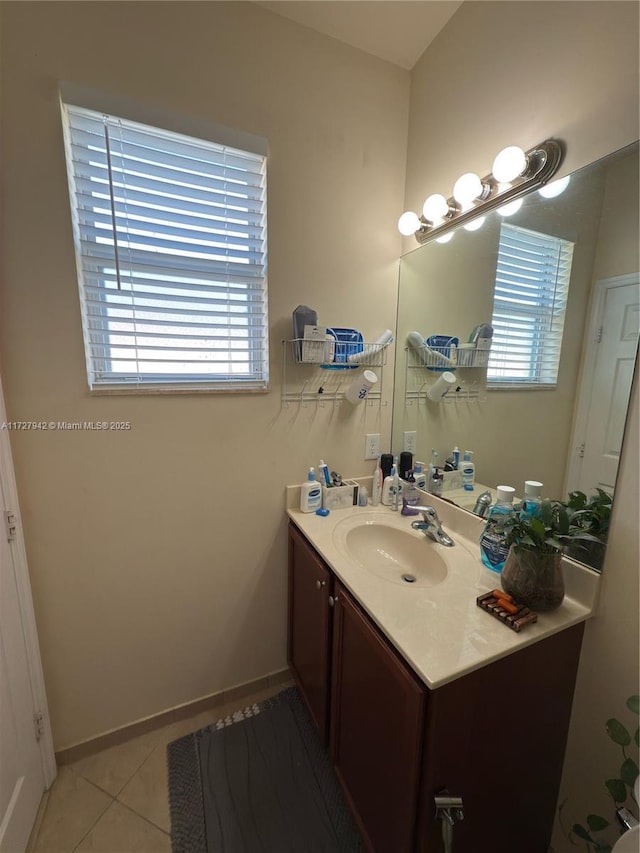 bathroom featuring tile patterned floors and vanity