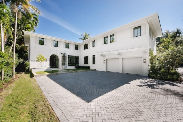 view of front of property featuring a garage