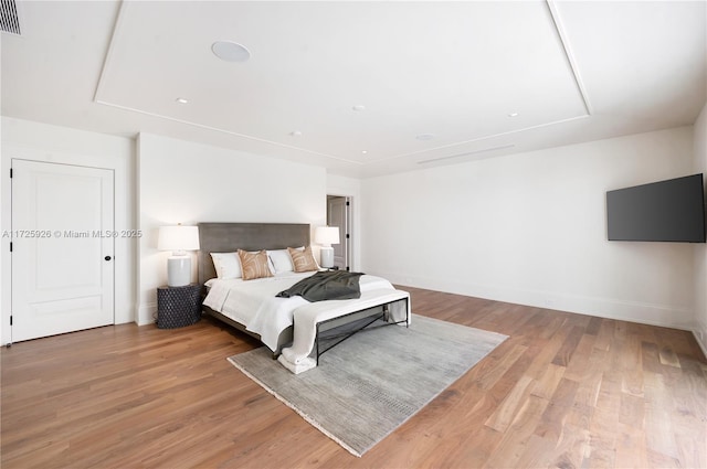 bedroom featuring hardwood / wood-style flooring