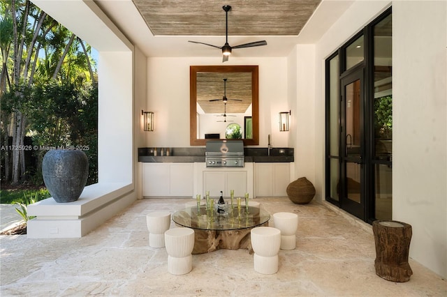 corridor featuring sink and wood ceiling