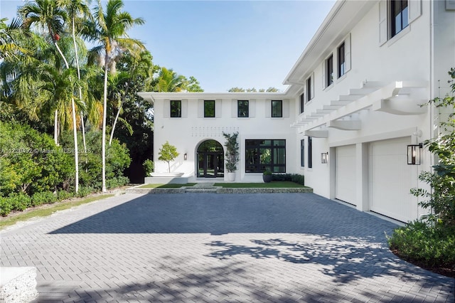 view of front of home with a garage