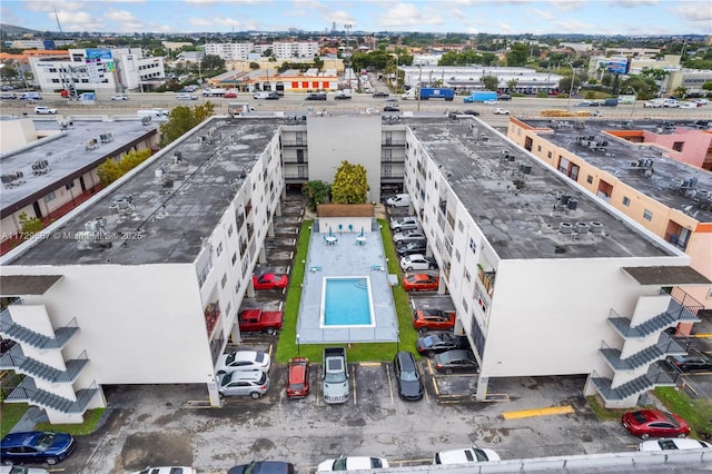 birds eye view of property featuring a view of city