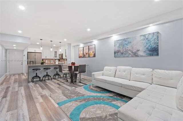 living room featuring light wood-type flooring