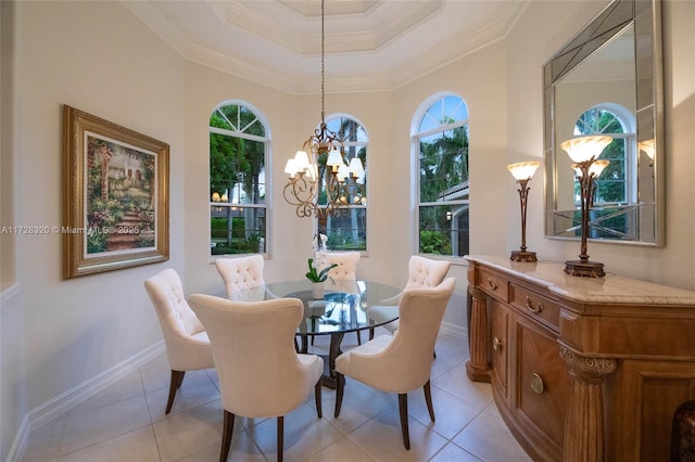 tiled dining area with crown molding, plenty of natural light, and a chandelier