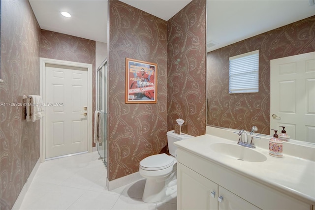 bathroom with tile patterned floors, vanity, and toilet