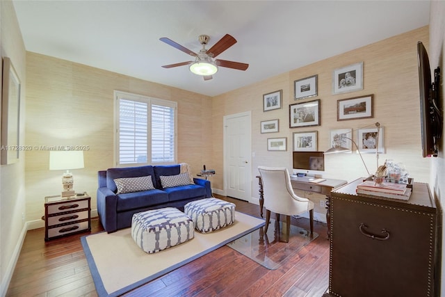 office with dark hardwood / wood-style floors and ceiling fan