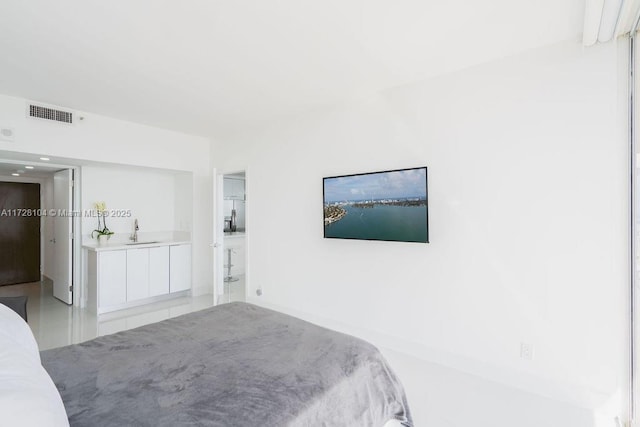 unfurnished bedroom featuring sink