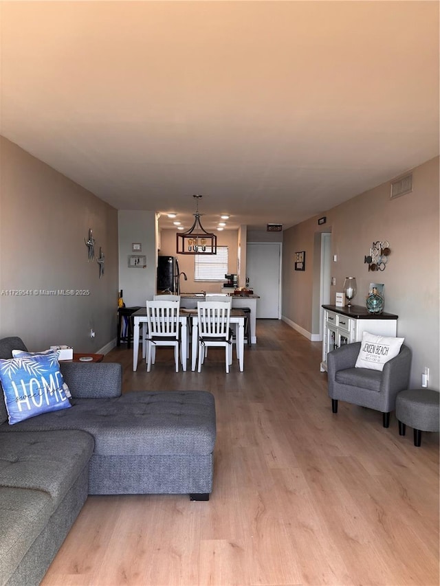 living room with wood-type flooring