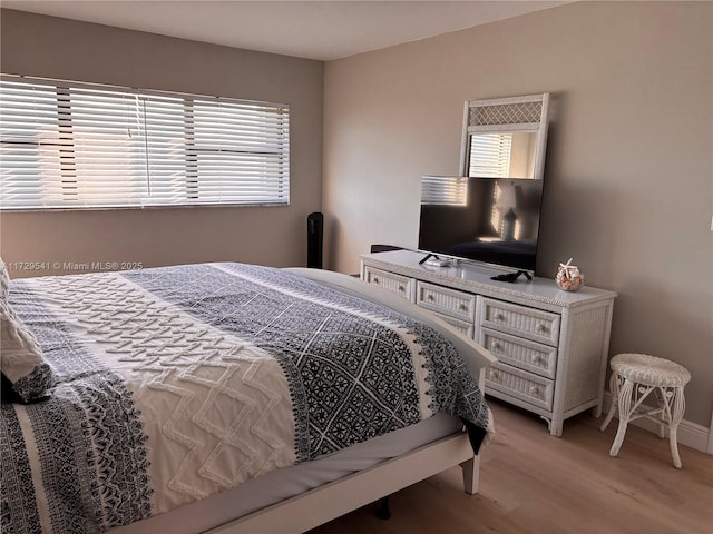 bedroom featuring light hardwood / wood-style floors