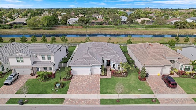 bird's eye view with a water view