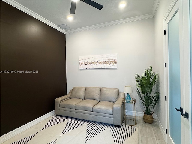 living room with crown molding and ceiling fan