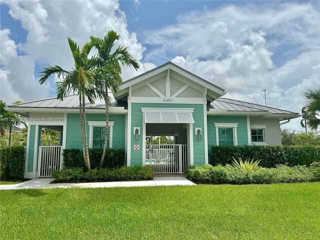 view of front of home with a front yard