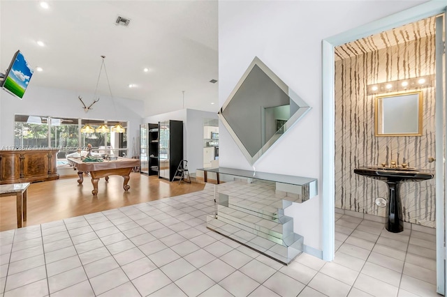 interior space featuring billiards and light tile patterned floors