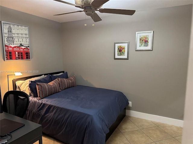 tiled bedroom with ceiling fan