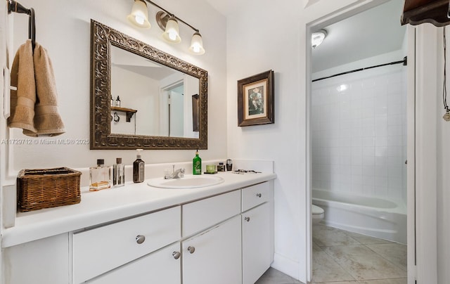 bathroom with tile patterned flooring, shower / bathtub combination, toilet, and vanity