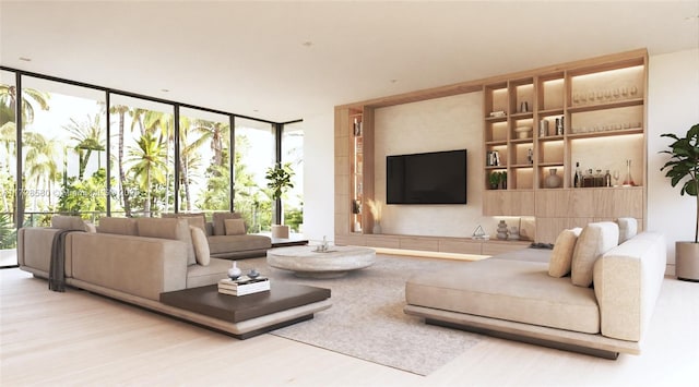 living room with light wood-type flooring and a wall of windows