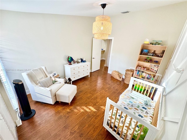 living area featuring dark hardwood / wood-style flooring