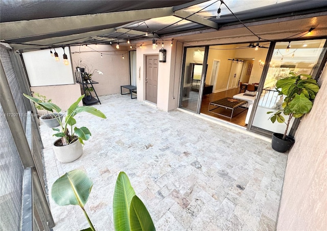 view of patio / terrace with a balcony