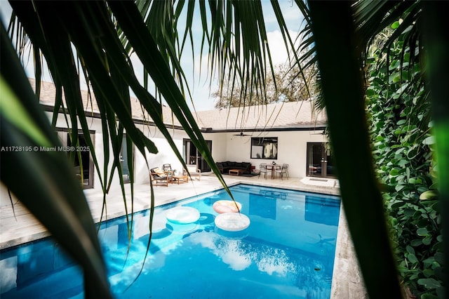 view of pool with a patio area