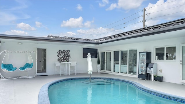 rear view of house featuring a patio area