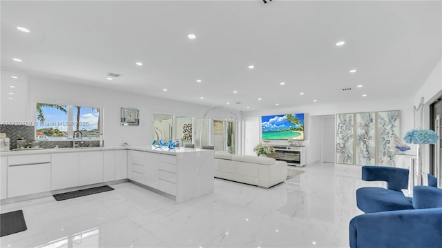 living room featuring sink