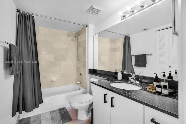 full bathroom with a textured ceiling, toilet, vanity, and shower / tub combo with curtain