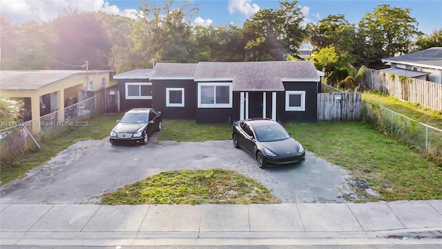 view of front of home with a front lawn