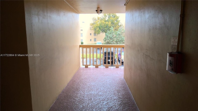 corridor featuring carpet