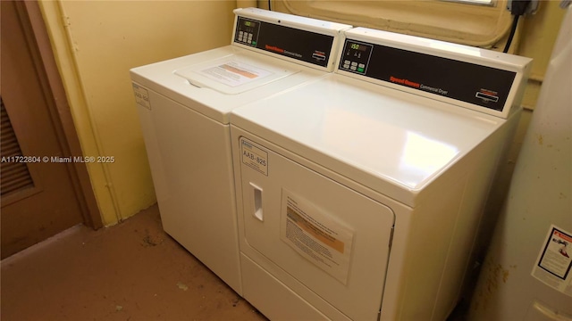 washroom featuring washing machine and dryer