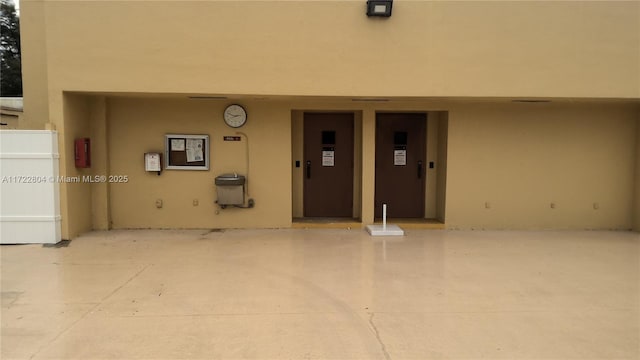 entrance to property featuring elevator