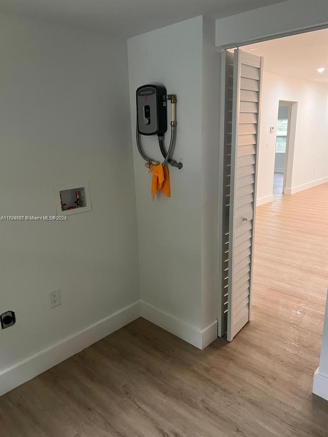 interior details featuring hardwood / wood-style flooring