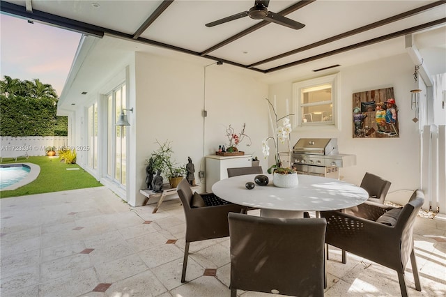 dining room featuring ceiling fan