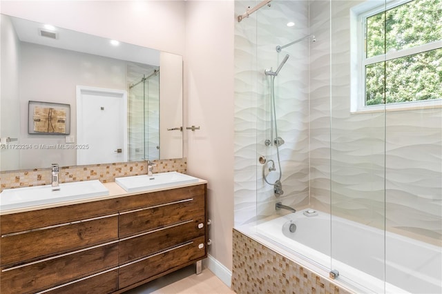 13100 Keystone Ter, North Miami, FL 33181 - bathroom with tiled shower / bath and double vanity