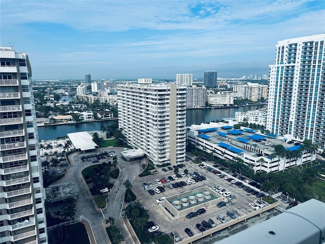 property's view of city featuring a water view