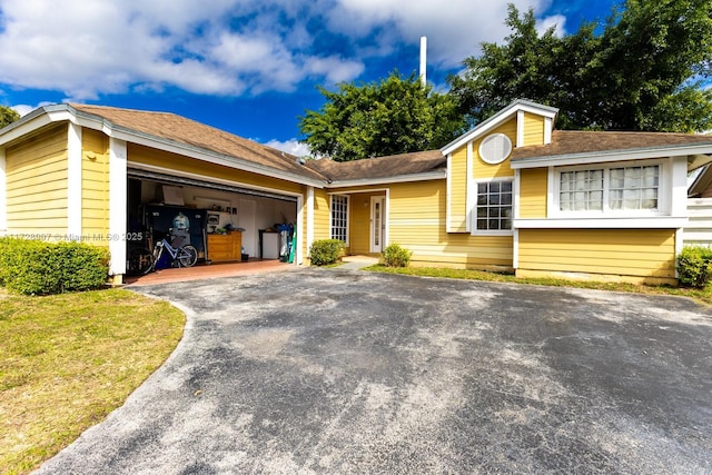 ranch-style home with a garage