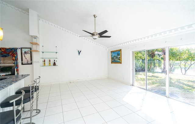 living room featuring crown molding, light tile patterned floors, and ceiling fan