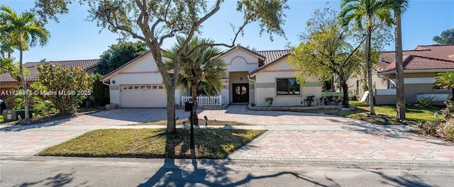 ranch-style home with a garage