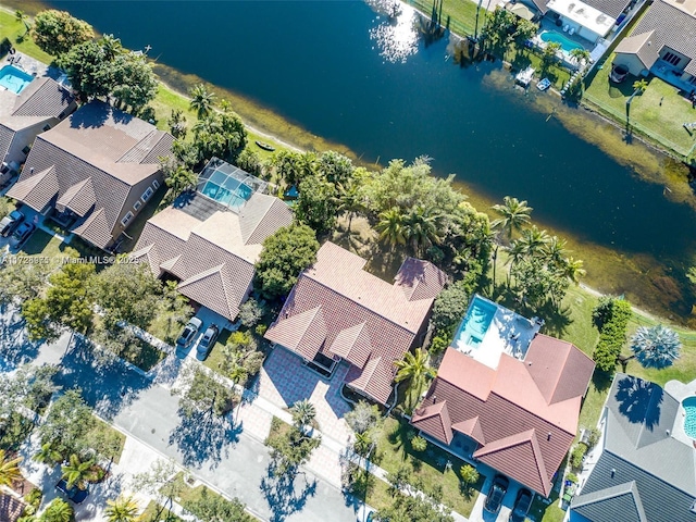 bird's eye view with a water view