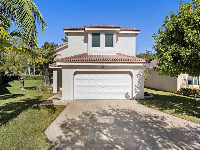 mediterranean / spanish-style home with a garage and a front yard