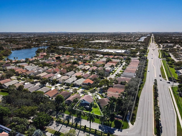 drone / aerial view featuring a water view