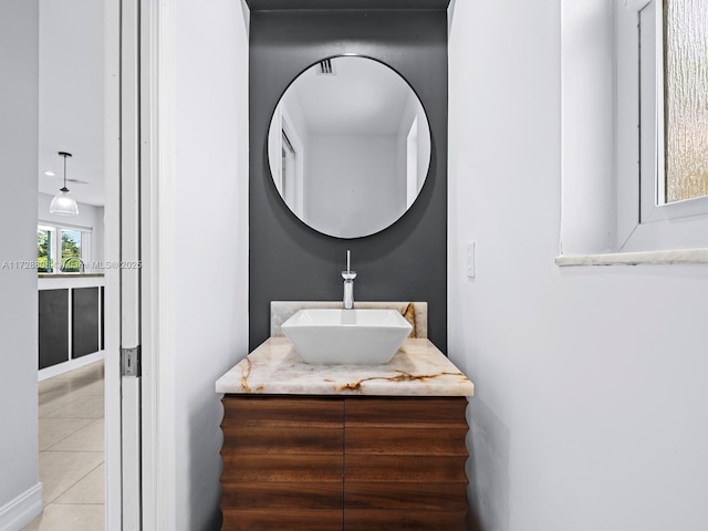 bathroom featuring tile patterned floors and vanity