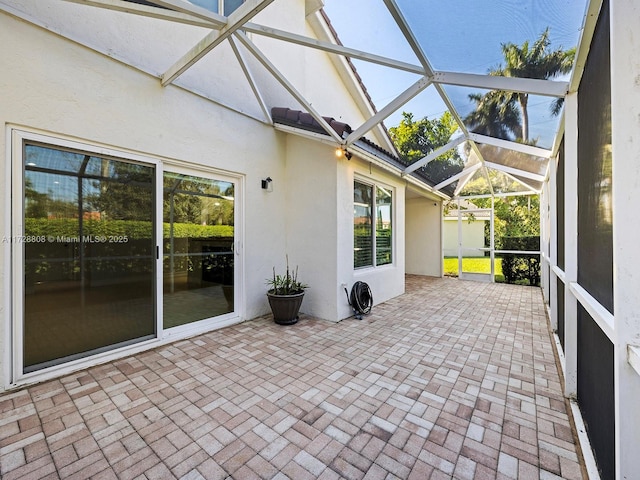 unfurnished sunroom with vaulted ceiling