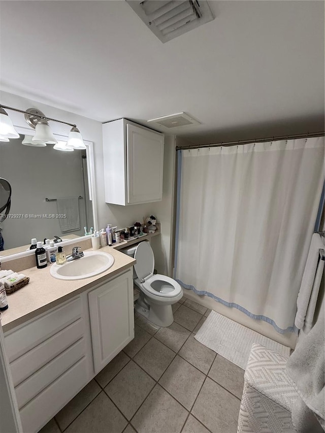 full bathroom featuring vanity, toilet, shower / bathtub combination with curtain, and tile patterned flooring