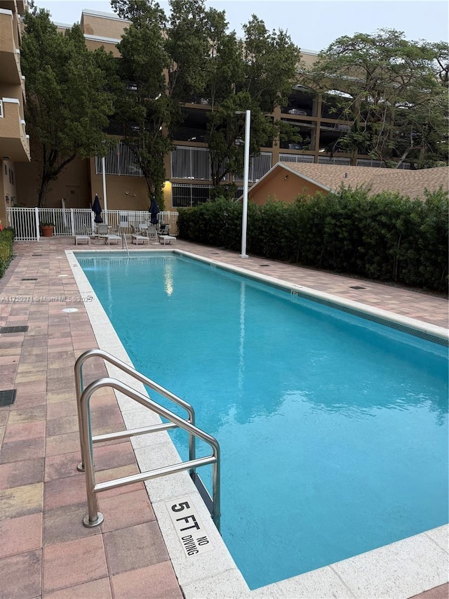 view of pool featuring a patio area