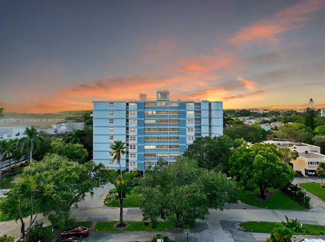 view of outdoor building at dusk